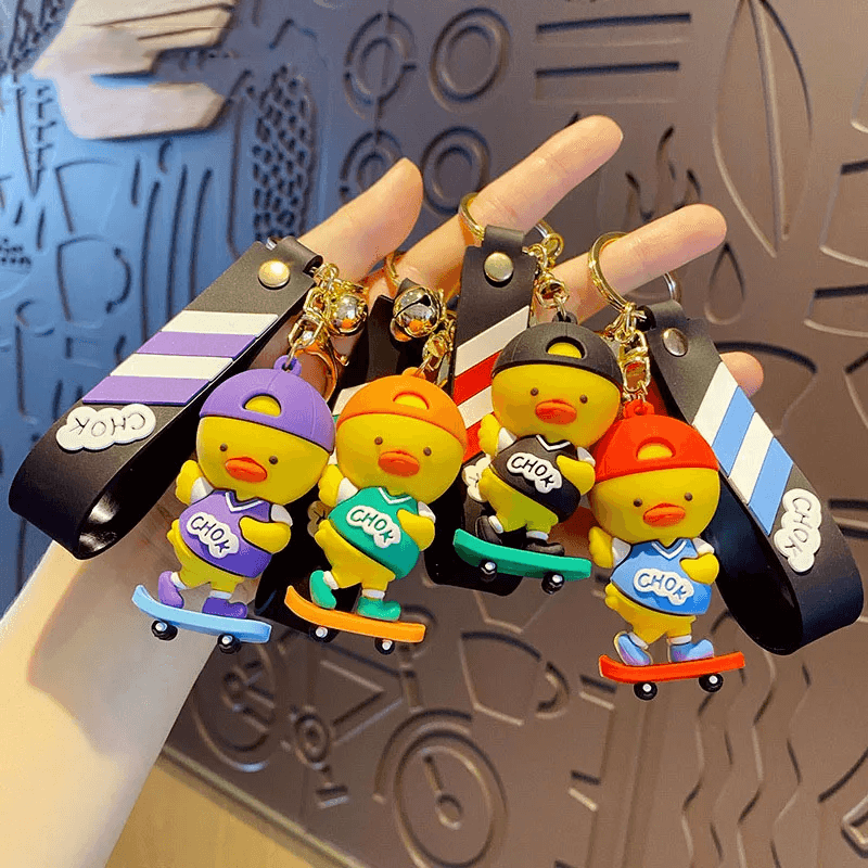 Creative Cartoon Skateboard Duck Keychain - Fun Sports Punk Design for Keys & Bags.