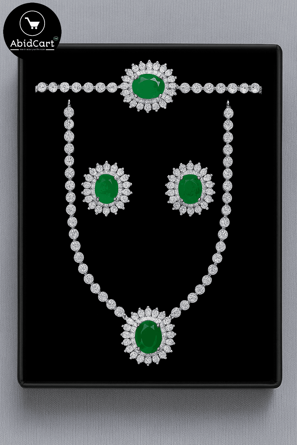 Emerald and Diamond Luxury Jewelry Set - Necklace, Bracelet, and Earrings.