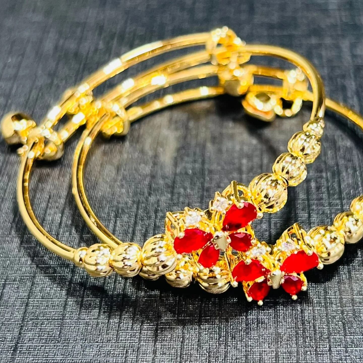 Gold Plated Designer Bangles for Women with Red Butterfly Stones â Elegant Traditional Party Wear Jewelry.
