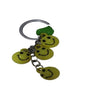 Bright Yellow Smiley Face Ball Keychain with Green Leaf Accent - Durable Plastic Design. - Abid Cart